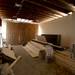 Materials are stacked in a bed room as construction continues on Paul Hickman's mid-century house on the west side of Ann Arbor. Melanie Maxwell I AnnArbor.com